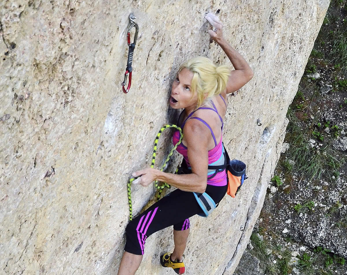 Lisa Horst climbing Goodluck Jonathan at Ten Sleep Canyon