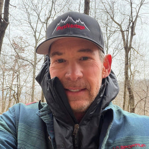 PhysiVantage truckers hat with Mountainscape logo